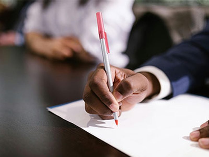 A client signing a document